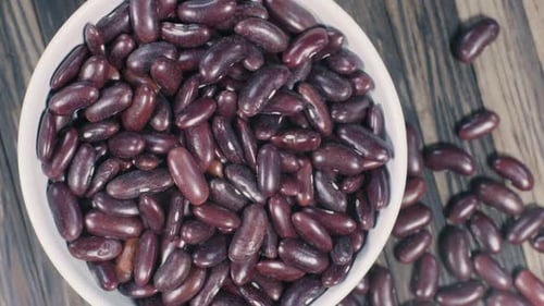Bowl of Kidney Beans on Wooden Surface