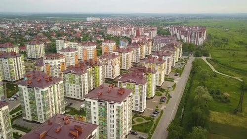 Aerial view of city residential area with high apartment buildings.