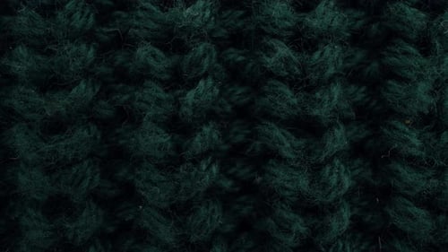 Close Up of Dark Green Knitted Fabric