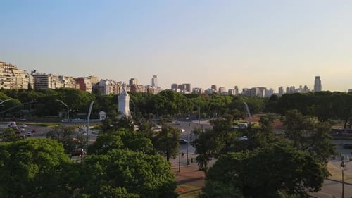Buenos Aires Palermo city landscape roundabout traffic and Palermo woodland at sunset golden hour ae