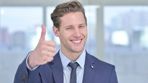 Young Adult Businessman Thumbs Up