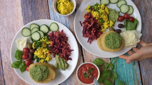 Plates of Colorful Vegetarian Food