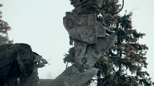Demolition Machine Breaks Concrete and Steel