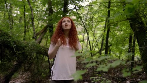 Girl Looking Around in the Forest