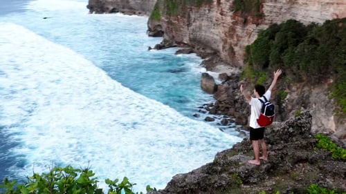 Successful Young Man Silhouette Standing On Ocean Cliff Aerial Raising Arms Happiness Joy Freedom