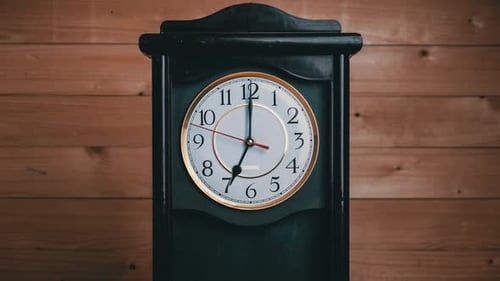 Timelapse of Vintage Clock with Full Turn of Time Hands at 7 AM or PM