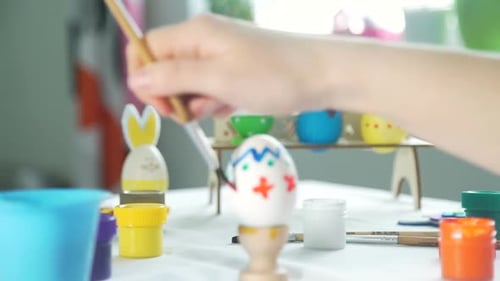 Painting Easter Eggs for Springtime Holiday Fun