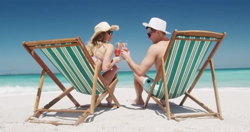 Couple in love enjoying free time on the beach together