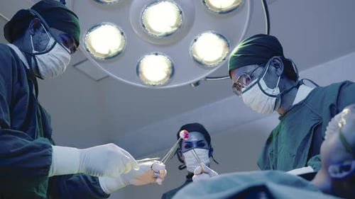 Medical Team Performs Operation in Hospital Operating Room
