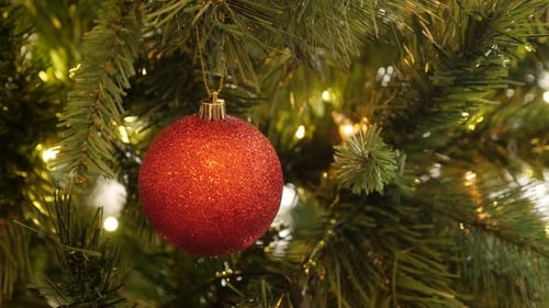 Close-up of red Christmas ornament with sequins 4K 2160p 30fps UltraHD footage - Decorative bauble