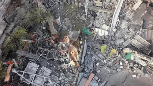 An Aerial View of Ruined Construction Piled Upon the Ground