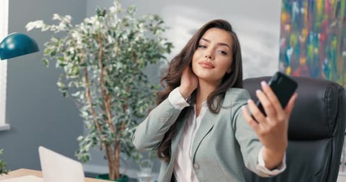 Popular Blogger Influencer Takes Photo of Herself in Office During Break Elegant Beautiful Woman