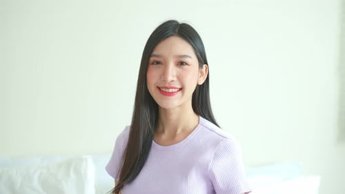 Smiling Young Woman Portrait in Home Setting