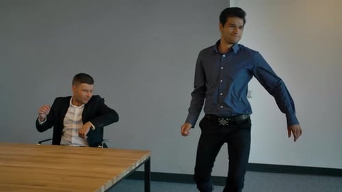 Musical. Everybody Dance Now. Businesspeople Start Dancing in Office.