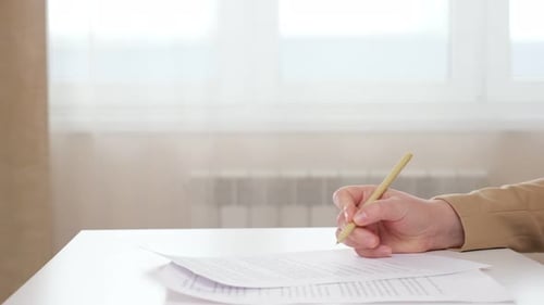 Bank Manager and Female Client Shake Hands After Signing of Rental Contract