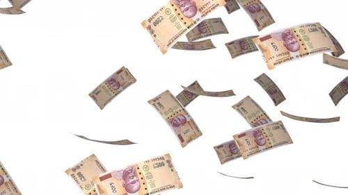 200 Indian Rupee bills falling down. Banknotes isolated on white background.
