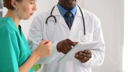 Doctor and Nurse Talk in Hospital Spbas