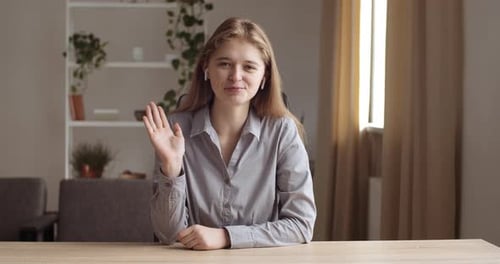 Friendly Young Adult Explaining Concept During Online Video Call