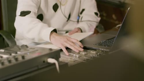 Young Caucasian Man Working at Music Recording Studio