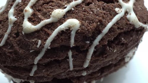 Delicious Brown Cookie with White Icing Close Up