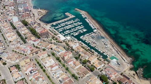 Aerial drone footage of the beach front on the Spanish island of Majorca Mallorca, Spain