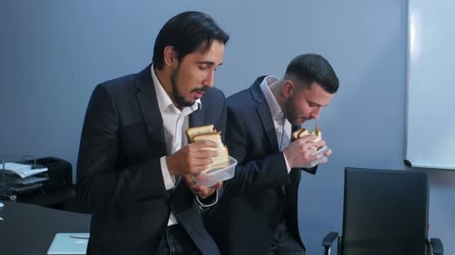 Office Workers Have a Break From Work To Eat Second Breakfast