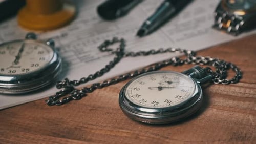 Close up of Vintage Silver Stopwatches on Table