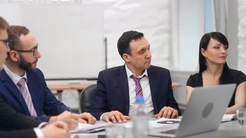 Stylish People in Suit at Business Meeting Discussing Work at Office Medium Shot
