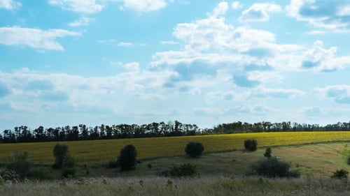 Moving Clouds in Blue Sky Above Landscape Fields. Timelapse. Amazing Rural Valley. Ukraine