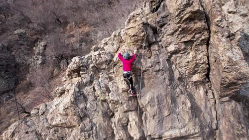 Rock Climbing Training on Steep Slope in Mountains