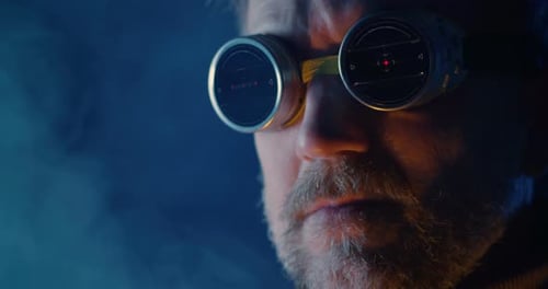 Man Wearing Futuristic Glasses with Scanning Graphics