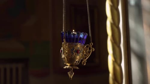 Burning Candles in the Church