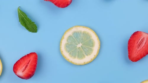 Vibrant Fruit Slices and Mint Leaves Flat Lay