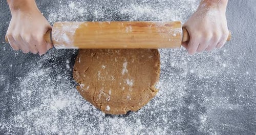 Woman using rolling pin 4k