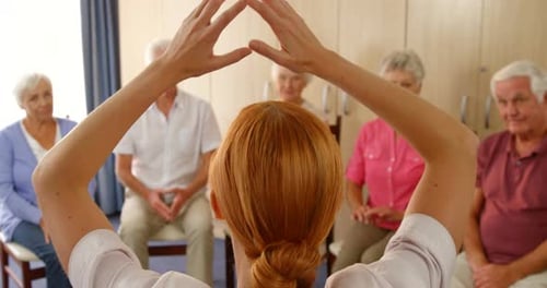 Seniors Exercise Group Led by Young Adult