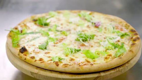 Delicious Pizza with Lettuce on Wooden Platter