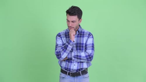 Man Thinking Against Chroma Key Background