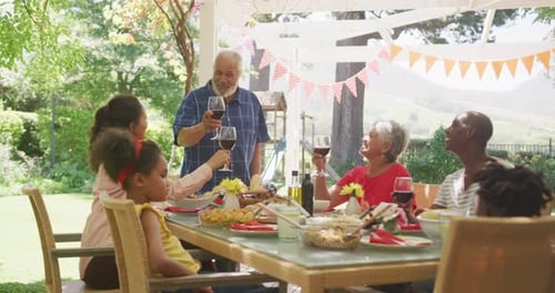 Multi-generation African American family spending time in garden