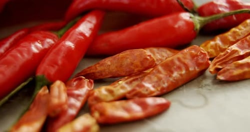 Red Chili Peppers and Dried Chili Peppers Close Up