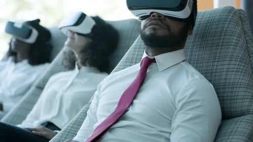 Business People in Virtual Reality Headsets