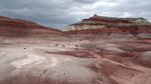 Flying low over colorful hills in the Mars like landscape
