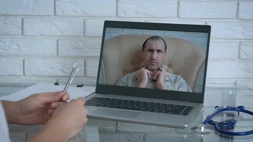 Digital Telehealth Consultation with Patient on Laptop Screen