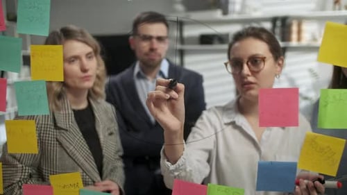 Business Team Brainstorming Together in Modern Office