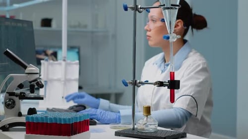 Scientist Analyzing Data in a Lab