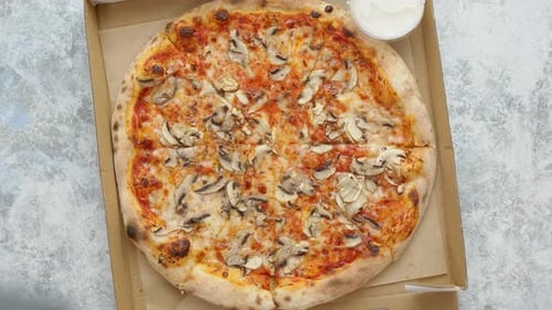 Overhead View of Delicious Mushroom Pizza in Box