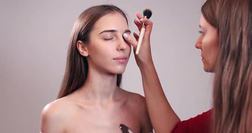 Applying Eye Shadow with Brush for Beauty