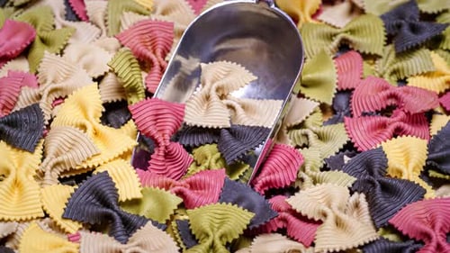 Colorful Bow Tie Pasta with Silver Scoop
