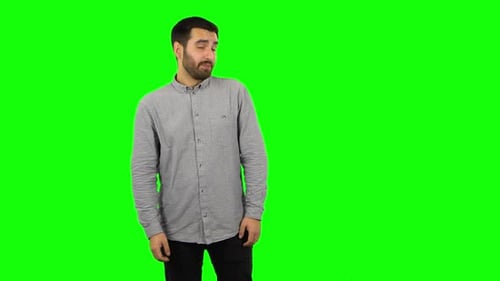 Brunette Guy Is Waiting and Yawning with Boredom. Green Screen