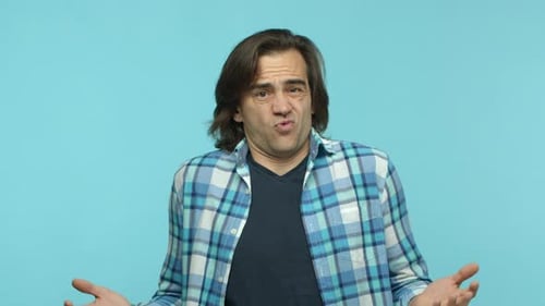Slow Motion of Confused Brunette Man Cant Understand Shrugging and Asking What with Hands Stretched