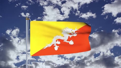 Bhutanese Flag Waving Under Blue Sky